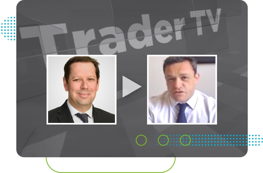 Screenshot of two men talking on Trader TV